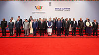 Photo: PMO via PTI  : world leaders pose for a group photograph at Bharat Mandapam on the second day of the BRICS Summit 2026, in New Delhi.