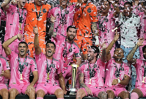 Inter Miami forward Lionel Messi, center, celebrates with his teammates after winning the Campeones Cup soccer match against Cruz Azul, Wednesday, Sept. 16, 2026, in Miami. 