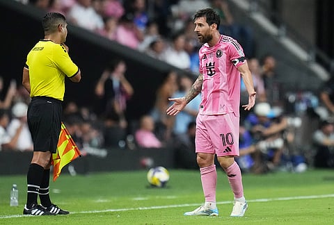 Inter Miami forward Lionel Messi (10) talks with an official during the first half of the Campeones Cup soccer match against Cruz Azul, Wednesday, Sept. 16, 2026, in Miami.