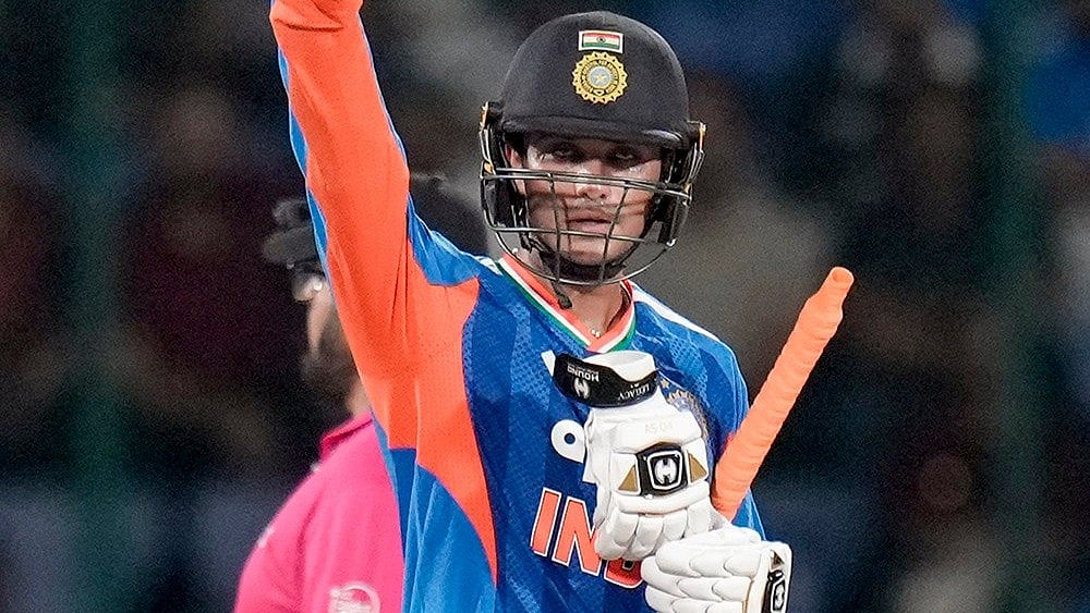 India's Abhishek Sharma celebrates his half century during the first T20I cricket match between India and Afghanistan, in New Delhi, Sunday, Sept. 13, 2026.
 - | Photo: PTI/Money Sharma