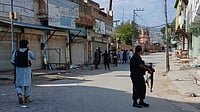 At Least 16 Killed, Dozens Injured In Mosque Suicide Blast In Pakistan | AP/BS Gillani : Police Secures The Road After A Bomb Blast At A Mosque In Kohat, Khyber Pakhtunkhwa Province In Pakistan