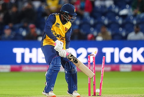 Sri Lanka's Kamindu Mendis is bowled by England's Jamie Overton during the second IT20 match between England and Sri Lanka in Cardiff, Wales, Thursday Sept. 17, 2026. 