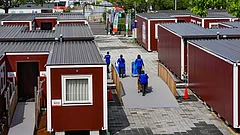 Containers set up to house athletes from various countries participating in the 20th Asian Games, in Nagoya, Japan. The Asian Games organising committee has chosen containers and a cruise ship to accommodate athletes this time. - | Photo: PTI/Atul Yadav