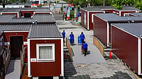 | Photo: PTI/Atul Yadav : Containers set up to house athletes from various countries participating in the 20th Asian Games, in Nagoya, Japan. The Asian Games organising committee has chosen containers and a cruise ship to accommodate athletes this time. 