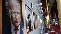 An official portrait of US President Donald Trump hangs in the Hall of Nations at the Kennedy Center - Reuters