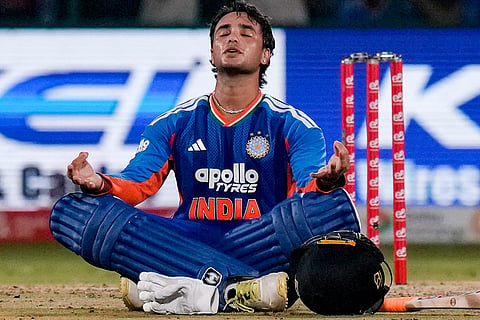 India's Abhishek Sharma reacts after his century during the third and final T20I cricket match between India and Afghanistan, in New Delhi.