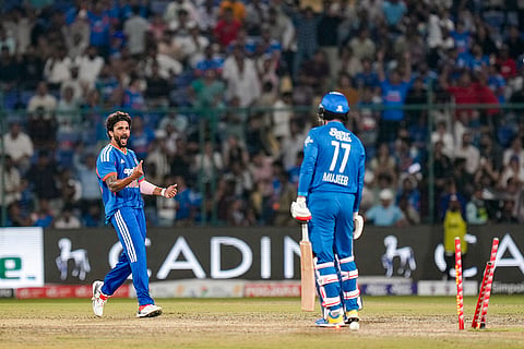 India's Nitish Kumar Reddy celebrates the wicket of Afghanistan's Mujeeb Ur Rahman during the third and final T20I cricket match between India and Afghanistan, in New Delhi.