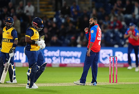 England's Adil Rashid celebrates taking the wicket of Sri Lanka's Charith Asalanka during the second IT20 match between England and Sri Lanka in Cardiff, Wales, Thursday Sept. 17, 2026. 