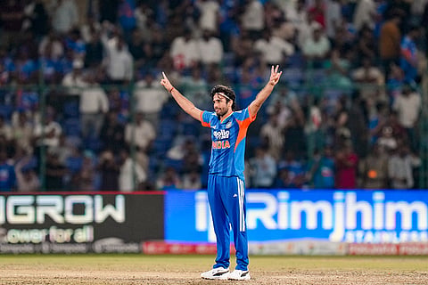 India's Ravi Bishnoi celebrates the wicket of Afghanistan's Rashid Khan during the third and final T20I cricket match between India and Afghanistan, in New Delhi.