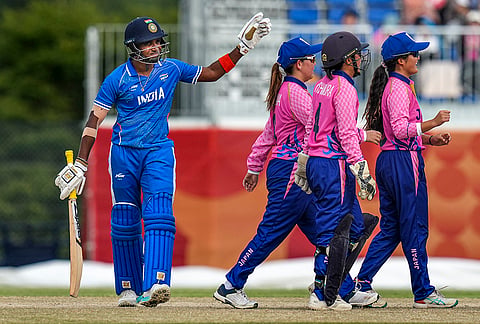 India’s Bharti Fulmali returns to pavilion after her dismissal by Japan's Kato Stafford during the Asian Games fourth Women’s Quarter- final cricket match against Japan, in Nisshin, Japan, Friday, Sept. 18, 2026. 
