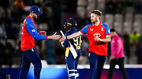 | Photo: John Walton/PA via AP : England's Liam Dawson, right, celebrates the wicket of Sri Lanka's Dushmantha Chameera to secure victory during the first IT20 match between England and Sri Lanka in Southampton, England, Tuesday Sept. 15, 2026. 