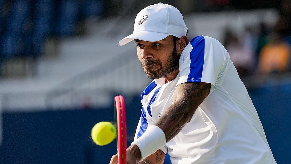 India's Sumit Nagal competes against Netherlands' Guy Den Ouden, unseen, during the 2026 Davis Cup Qualifiers first round tie, in Bengaluru, Karnataka. - Photo: PTI/Shailendra Bhojak