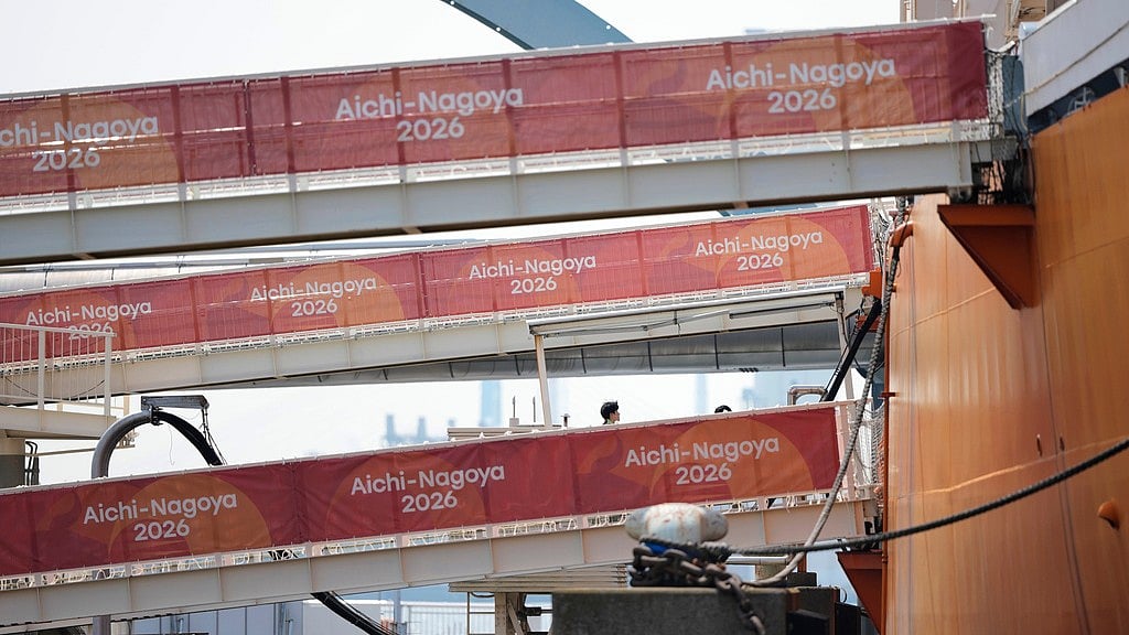 A man walks aboard a cruise ship ahead of the Asian Games in Nagoya, Japan. - Dita Alangkara/AP Photo