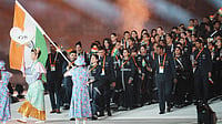 Asian Games 2026 Opening Ceremony Live: India Contingent Makes Grand Entrance In Traditional Attire (AP Photo/Lee Jin-man) : India's flag bearers Manu Bhaker and Pawan Kumar walk with teammates into the stadium during the opening ceremony for the Asian Games in Nagoya, Japan, Saturday, Sept. 19, 2026.