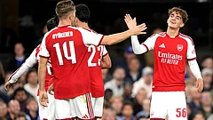 Arsenal's Max Dowman, right, celebrates scoring their side's third goal during the League Cup third round soccer match between Ipswich Town and Arsenal in Ipswich, England. - Joe Giddens/AP Photo