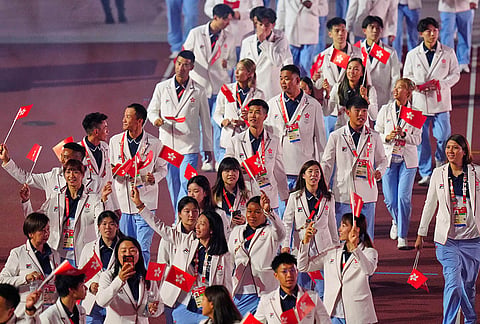 Hong Kong's athletes walk into the stadium during the opening ceremony for the Asian Games in Nagoya, Japan, Saturday, Sept. 19, 2026. 