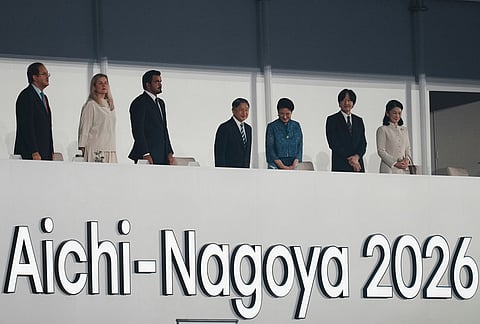 Japan's Emperor Naruhito, centre, Empress Masako, Crown Prince Akishino and Crown Princess Kiko, right, stand with President of the Asian Games Hideaki Ohmura, left, International Olympic Committee President, Kirsty Coventry and President of the Olympic Council of Asia, Sheikh Joaan bin Hamad bin Khalifa Al Thani at the opening ceremony during the opening ceremony for the Asian Games in Nagoya, Japan, Saturday, Sept. 19, 2026. 