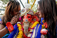 'Come Back Soon, Bappa': Devotees Bid Emotional Farewell On Fifth Day | Photo: PTI/Shiva Sharma : People offer prayers during the immersion of an idol of Lord Ganesh in a canal as part of the 'Ganesh Chaturthi' festival celebration on the outskirts of Amritsar, Punjab, Friday, Sept. 18, 2026.