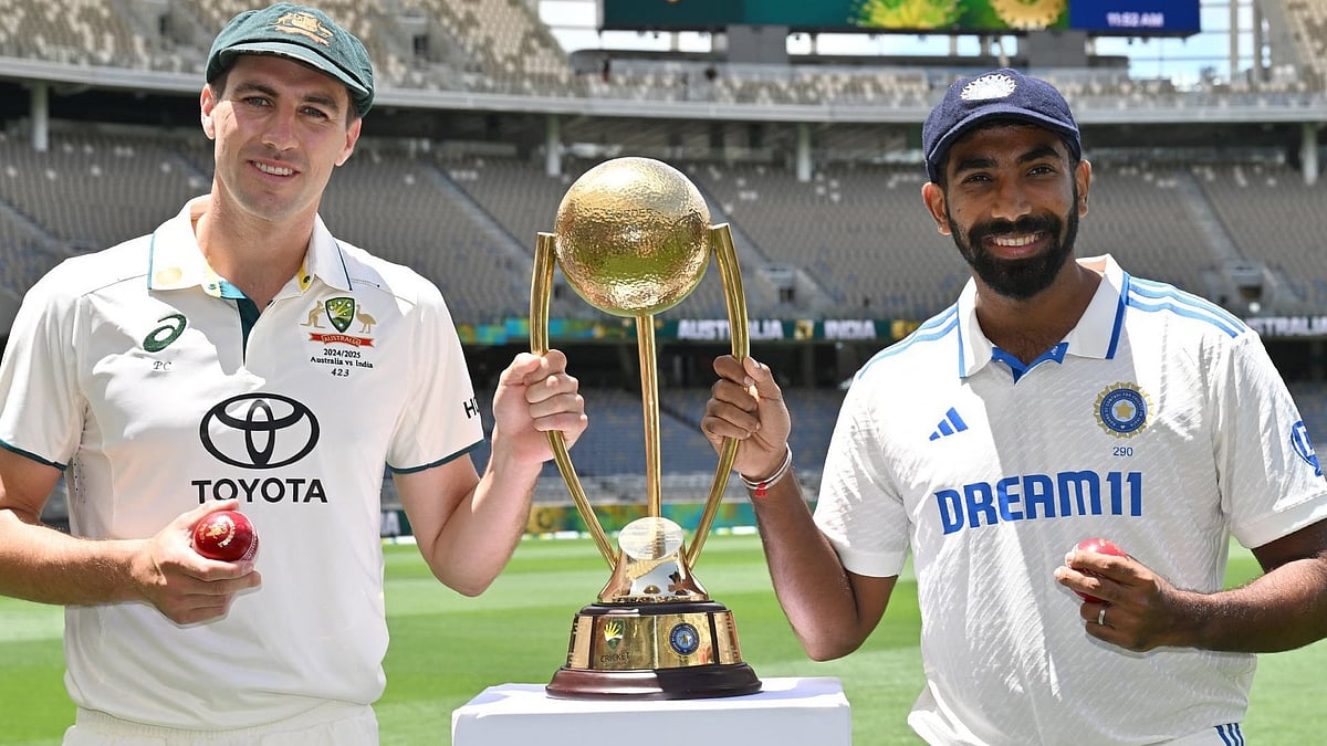 Pat Cummins (left) of Australia posing with the Border-Gavaskar Trophy alongside interim Test captain Jasprit Bumrah of India. - X/mufaddal_vohra