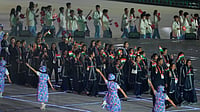 (AP Photo/Dita Alangkara) : Indian athletes react as they walk into the stadium during the opening ceremony for the Asian Games in Nagoya, Japan, Saturday, Sept. 19, 2026.