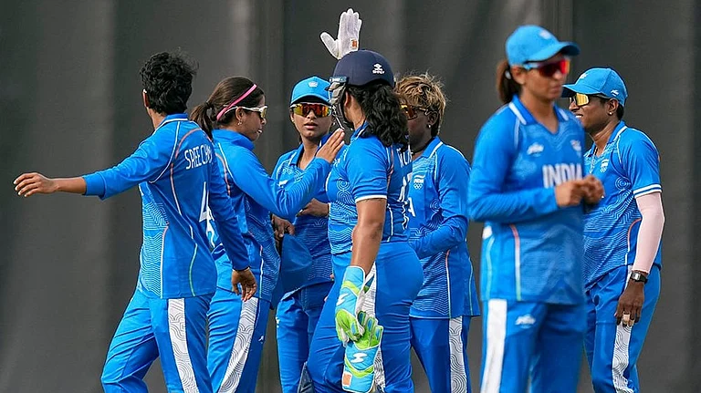India’s Richa Ghosh, Sree Charani and teammates during the Asian Games fourth Women’s Quarter final cricket match against Japan, in Nisshin, Japan, Friday, Sept. 18, 2026. - | Photo: PTI/Atul Yadav