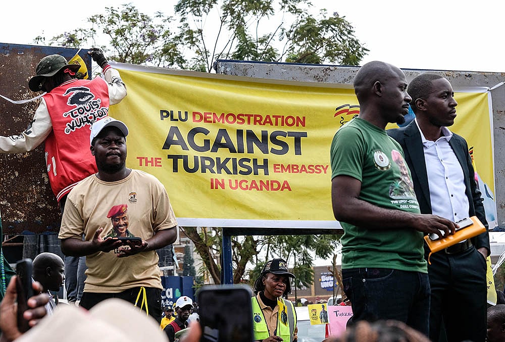 Members of the Patriotic League of Uganda demonstrate outside the Turkish Embassy demanding the extradition of a dissident, Fred Lumbuye, whose online activities are seen by local authorities as anti-government propaganda in Kampala, Uganda, Friday, Sept. 18, 2026.  - | Photo: AP/Hajarah Nalwadda