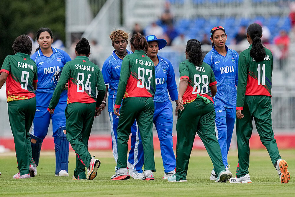 India's captain Harmanpreet Kaur, second right, shakes hand after team's win in the second semifinal T20I cricket match between India’s women and Bangladesh’s women in the ongoing Asian Games 2026, at Aichi Prefectural Korogi Sports Park in Nisshin, Japan. - | Photo: PTI/Arun Sharma