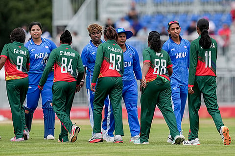 India's captain Harmanpreet Kaur, second right, shakes hand after team's win in the second semifinal T20I cricket match between India’s women and Bangladesh’s women in the ongoing Asian Games 2026, at Aichi Prefectural Korogi Sports Park in Nisshin, Japan.