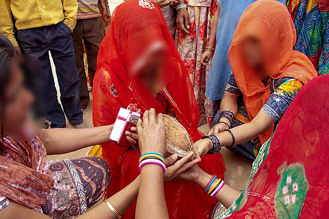 This image received on Sept. 20, 2026 shows women performing rituals at Vadia village, in Banaskantha district, Gujarat.