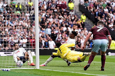 Tottenham Hotspur's Mohammed Kudus scores his side's first goal, only the goal to be ruled out by VAR, during the English Premier League soccer match between Tottenham Hotspur and Aston Villa, at Tottenham Hotspur Stadium in London.