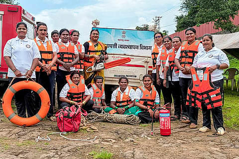 Transgender community members trained by Kolhapur District Disaster Management Authority in flood management, search and rescue, first aid and Cardiopulmonary Resuscitation (CPR) pose for photographs, in Kolhapur, Maharashtra.