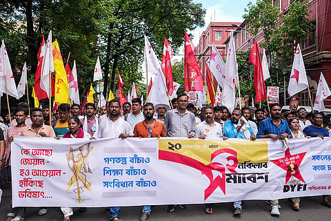 Democratic Youth Federation of India (DYFI) activists participate in a rally demanding to save democracy, the Constitution, and education, in Kolkata, West Bengal.