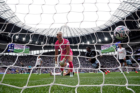 Aston Villa's Johan Manzambi scores the opening goal during the English Premier League soccer match between Tottenham Hotspur and Aston Villa, at Tottenham Hotspur Stadium in London.