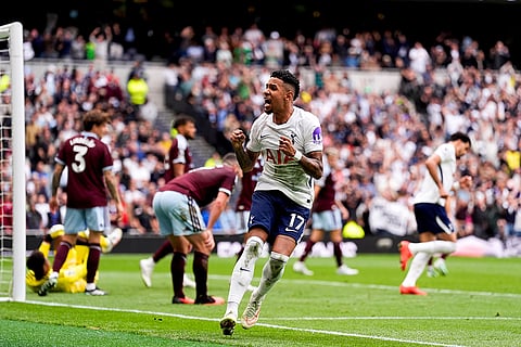 Tottenham Hotspur's Mohammed Kudus scores his side's first goal, only the goal to be ruled out by VAR, during the English Premier League soccer match between Tottenham Hotspur and Aston Villa, at Tottenham Hotspur Stadium in London.