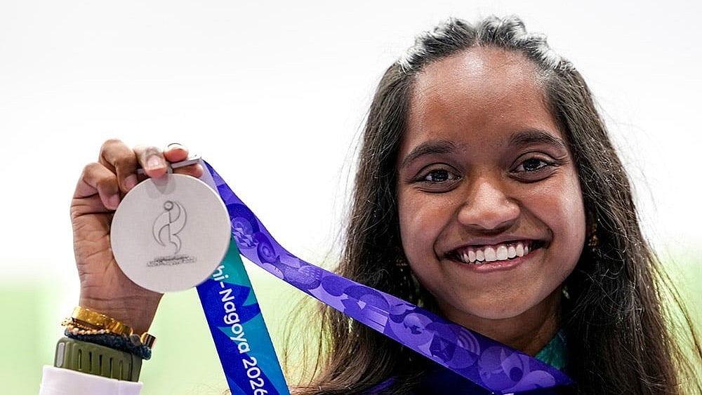 India’s Elavenil Valarivan celebrates after winning silver medal in the women's 10m air rifle event shooting match in the ongoing Asian Games 2026, in Nagoya, Japan. - Photo: PTI/Atul Yadav