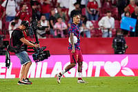 Sevilla Vs Barcelona, La Liga 2026-27: Raphinha’s Hat-Trick Inspires Blaugrana To Secure 3-1 Comeback Win | Photo: AP/Jose Breton : Barcelona's Raphinha walks after the Spanish La Liga soccer match between Sevilla and Barcelona in Seville, Spain.