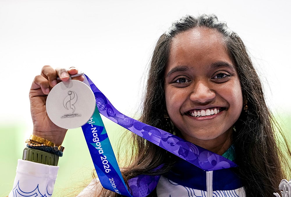 India’s Elavenil Valarivan celebrates after winning silver medal in the women's 10m air rifle event shooting match in the ongoing Asian Games 2026, in Nagoya, Japan, Sunday, Sept. 20, 2026. - | Photo: PTI/Atul Yadav