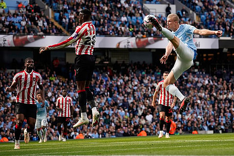 Manchester City's Erling Haaland shoots during the English Premier League soccer match between Manchester City and Sunderland in Manchester, England.