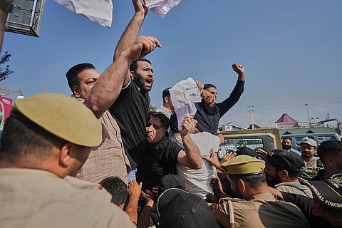 Police detain supporters of the Jammu Kashmir Apni Party during a protest demanding jobs, opposing a power tariff hike and pressing other demands in Srinagar, Kashmir.