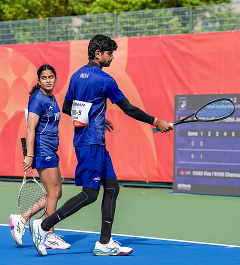 India’s Aadhya Tiwari and Jay Meena compete in the mixed doubles group B soft tennis match in the ongoing 20th Asian Games, at Higashiyama Park Tennis Center , in Nagoya, Japan.