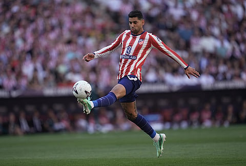 Atletico Madrid's Cristian Romero controls the ball during a Spanish La Liga soccer match between Atletico Madrid and Real Madrid in Madrid, Sunday, Sept. 20, 2026. 