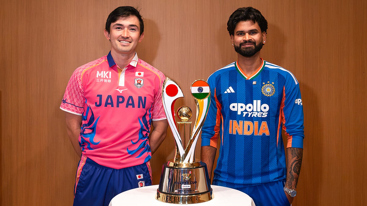 Japan captain Kendel Fleming and India captain Shreyas Iyer standing together posing with the trophy ahead of the One-off T20I in Japan - X/BCCI