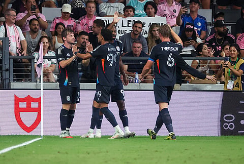 San Diego FC midfielder Anders Dreyer, left, celebrates with teammates after scoring against Inter Miami during the second half of an MLS soccer game, Sunday, Sept. 20, 2026, in Miami. 