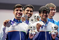 | Photo: PTI/Atul Yadav : India’s Himanshu Dhillon, left, Rudrankksh Patil, Parth Rakesh Mane, right, and others pose for photographs after wiining silver medal in the 10 meter rifle men team event in the ongoing 20th Asian Games 2026, in Nagoya, Japan, Monday, Sept. 21, 2026. 