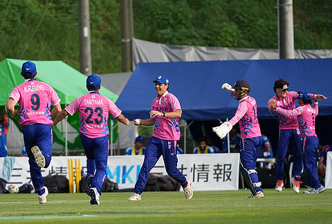 Japan's players celebrate a Indian wicket during the Suzuki Cup T20 cricket match in Sano, Japan, Tuesday, Sept. 22, 2026, marking 75 years of diplomatic relations between the two countries.