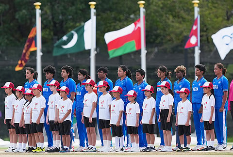 Team India stands for the national anthem before the start of the women's gold medal T20 cricket game between India and Sri Lanka at the Asian Games in Nisshin, Japan, Tuesday, Sept. 22, 2026. 