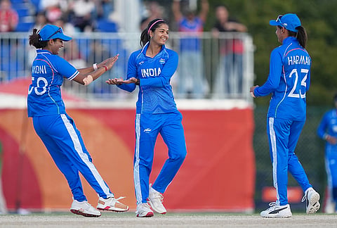 India's Shreyanka Rajesh Patil celebrates with teammates the wicket of Sri Lanka's HM Dissanayaka Samarawickram during the women's gold medal T20 cricket game between India and Sri Lanka at the Asian Games in Nisshin, Japan, Tuesday, Sept. 22, 2026. 