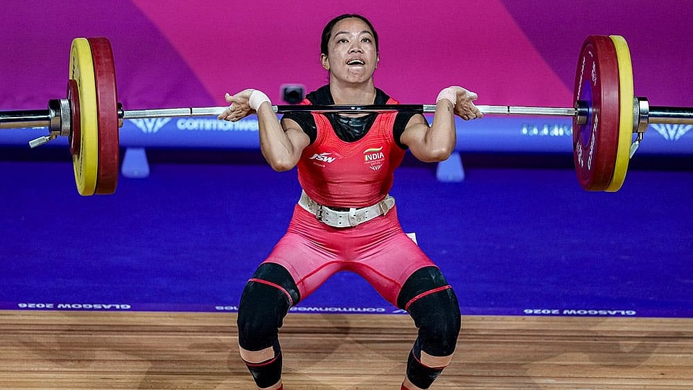 India's Mirabai Chanu competes in the women's 48kg Final weightlifting competition at the 23rd Commonwealth Games, in Glasgow, Scotland. - Photo: PTI/Ravi Choudhary