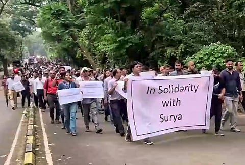 Faculty members of the Indian Institute of Technology (IIT-Bombay) hold a march in the institute’s campus to support Suryanarayana Doolla, who was removed as Dean of Administrative Affairs amid protests by students over the suicide of a 22-year-old student, in Mumbai, Monday, Sept. 21, 2026. 