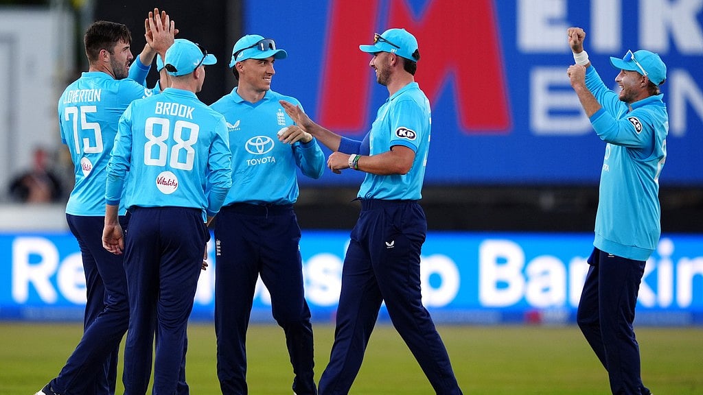 England's Tom Banton celebrates the wicket of Sri Lanka's Pavan Rathnayake during the 1st one day cricket international between England and Sri Lanka in Chester-le-Street, England. - Owen Humphreys/AP Photo
